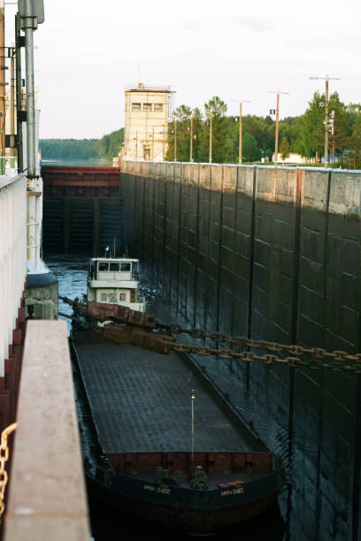 istock Vytegra. Russia. June 2018: Cargo barge is locked. 1042684260