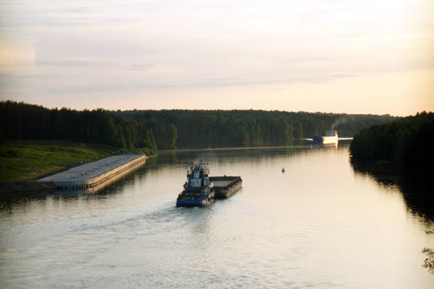 istock Vytegra. Russia. June 2018: Cargo barge is locked. 1042684576