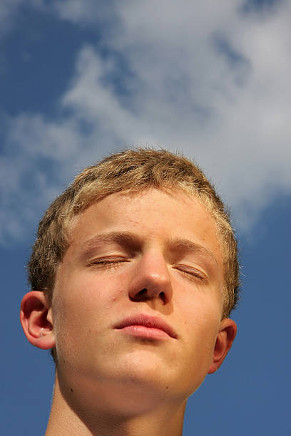 istock sun tanning teenager 104268621
