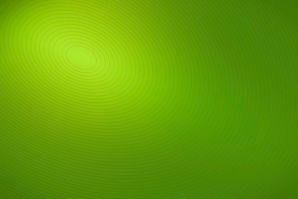 istock Abstract Smooth Background Color Gradient of Concentric Ellipses in Vivid Green 1042700360