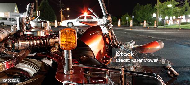 Close Up Photograph Of A Crashed Motorcycle And Police Car Stock Photo - Download Image Now