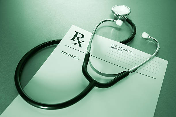 RX prescription form and stethoscope stock photo