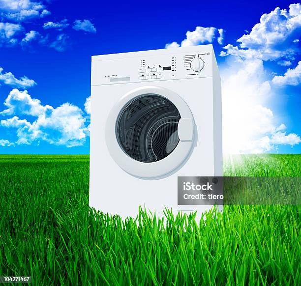 Washing Machine And Green Field Stock Photo - Download Image Now - Appliance, Blue, Cloud - Sky