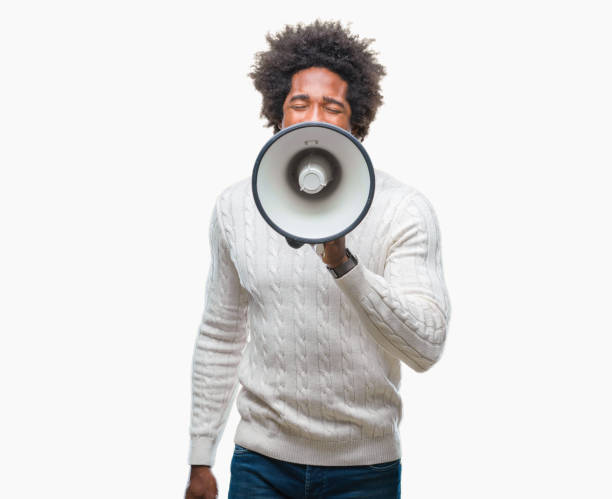 young handsome afro american black man shouting through megaphone - marketing megaphone child using voice imagens e fotografias de stock