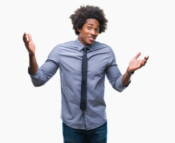 istock Afro american business man over isolated background clueless and confused expression with arms and hands raised. Doubt concept. 1042723714