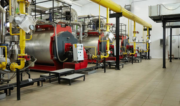 istock Modern new gas heating coppers work in a boiler room. 1042724374