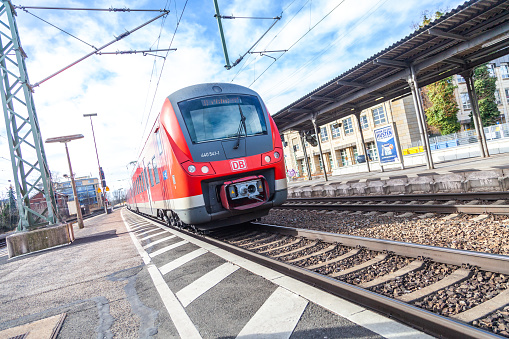 Fuerth / Germany - March 11, 2018: RE Regional Express train from Deutsche Bahn passes train station fuerth in germany.