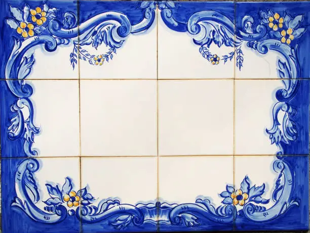 Photo of tile plaque in wall at portuguese street