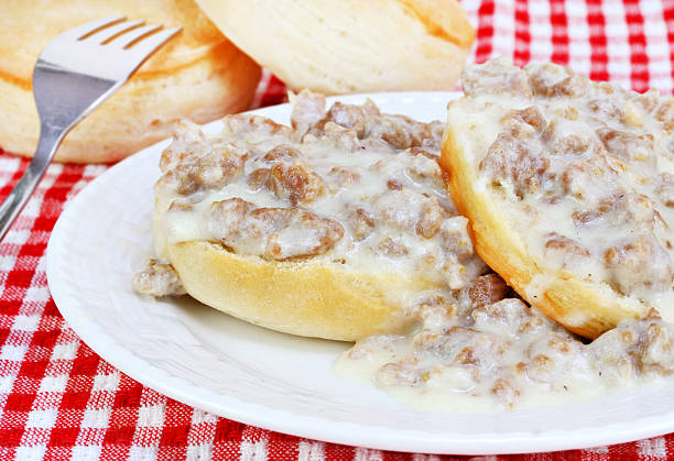 Biscuits, sausage and gravy  gravy stock pictures, royalty-free photos & images