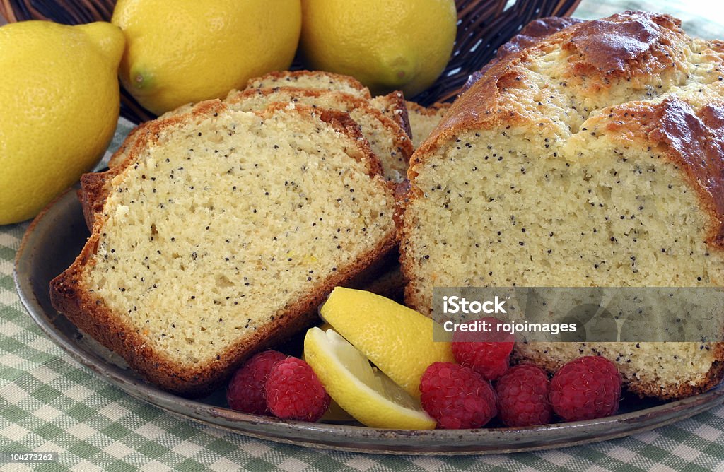 Torta al limone condito Poppyseed - Foto stock royalty-free di Torta al papavero