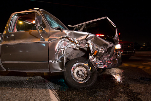 A crushed car after a head-on collision.