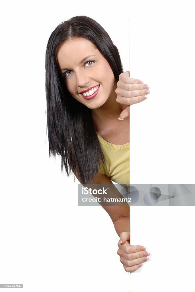 Friendly Menina espreitar de um quadro branco - Royalty-free Adulto Foto de stock