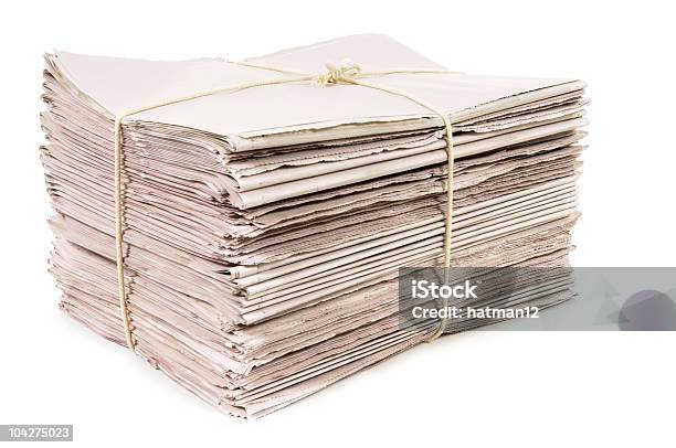 Newspapers Tied With Rope Stock Photo - Download Image Now - Newspaper, Tied Up, Bundle