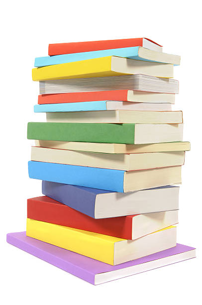untidy pila di libri colorati libro in brossura - paperback book stack white foto e immagini stock