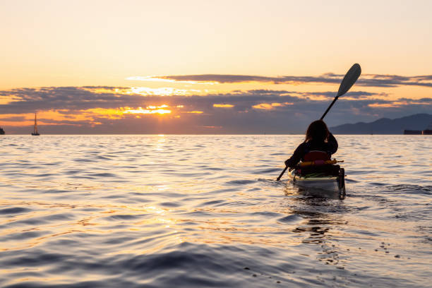 istock Sea Kayaking during a Vibrant Sunset 1042760578