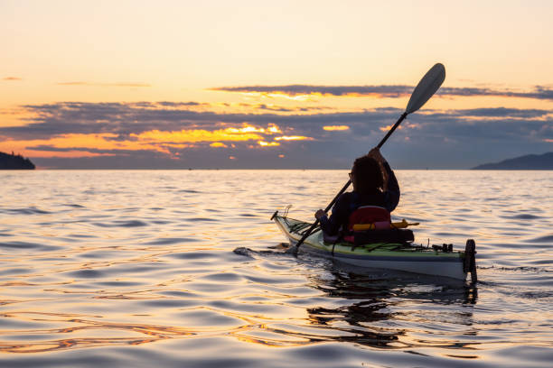istock Sea Kayaking during a Vibrant Sunset 1042760630