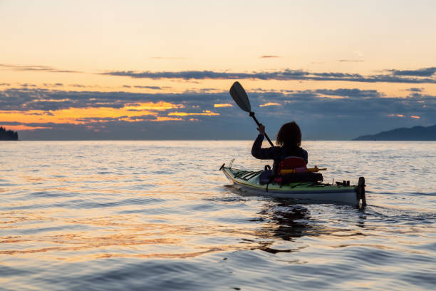 istock Sea Kayaking during a Vibrant Sunset 1042760648