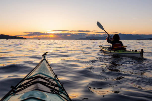 istock Sea Kayaking during a Vibrant Sunset 1042760696