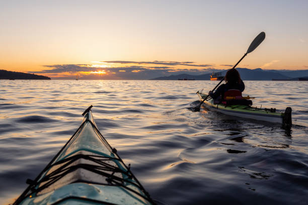 istock Sea Kayaking during a Vibrant Sunset 1042760700