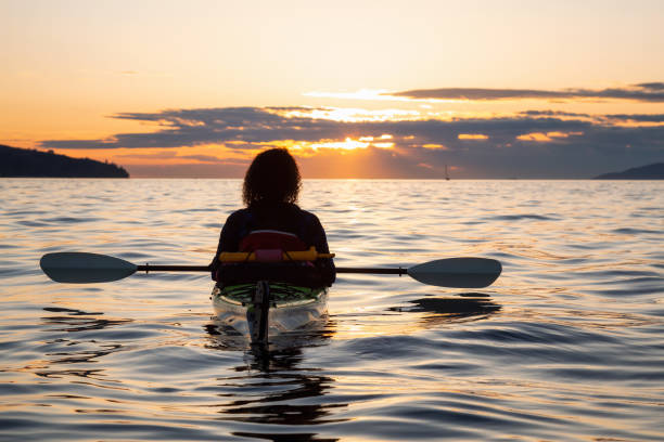 istock Sea Kayaking during a Vibrant Sunset 1042760722