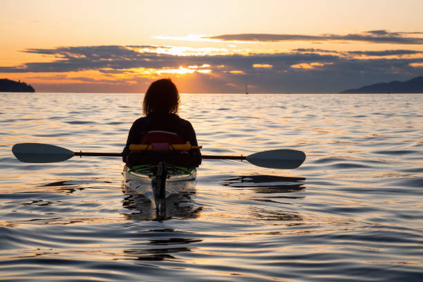 istock Sea Kayaking during a Vibrant Sunset 1042760726
