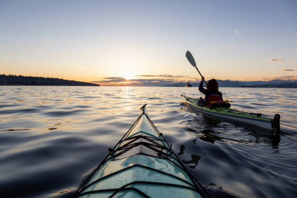 istock Sea Kayaking during a Vibrant Sunset 1042760776