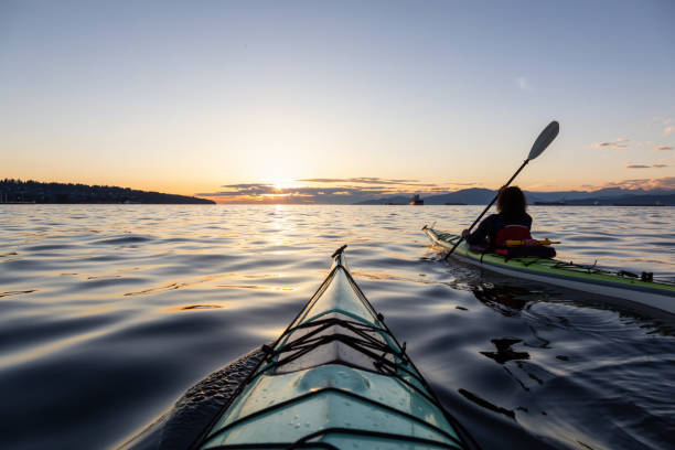 istock Sea Kayaking during a Vibrant Sunset 1042760784