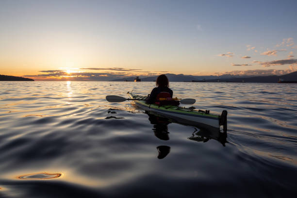 istock Sea Kayaking during a Vibrant Sunset 1042761542