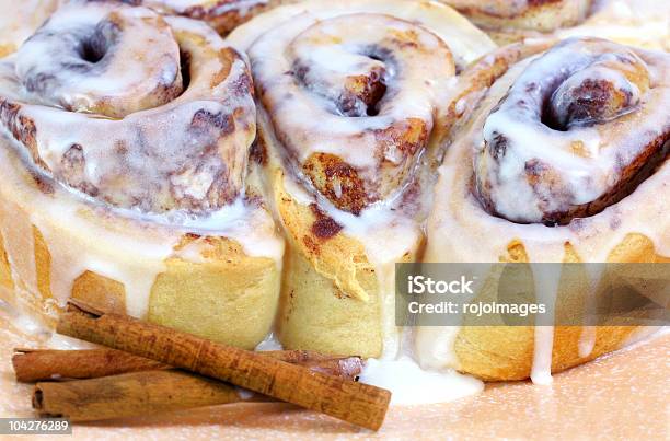 Three Fresh Baked Cinnamon Buns Stock Photo - Download Image Now - Baked, Bun - Bread, Cinnamon