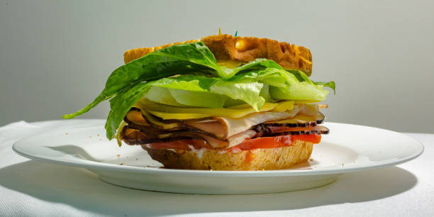 istock Deli sandwich on a plate with luscious filling 1042765906