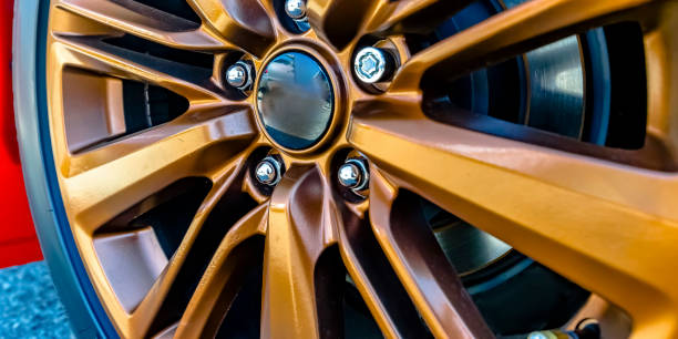 istock Golden tire rim with disc break showing through 1042765926