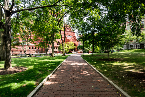 Philadelphia, USA - July 17, 2018: People walk in campus of Pennsylvania State University in Philadelphia. Penn State dates back to 1855.