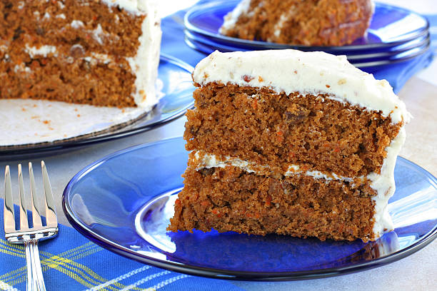 Healthy Carrot Cake with Cream Cheese Pecan Frosting  carrot cake stock pictures, royalty-free photos & images