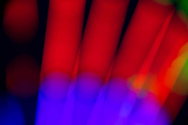 Abstract multi color of glow fluorescent on black background