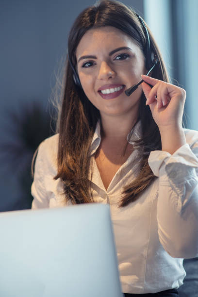 istock Customer Service agent in an startup office with laptop 1042786442