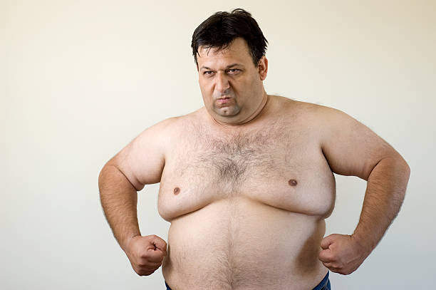 Overweight Man Posing  hairy fat man pictures stock pictures, royalty-free photos & images