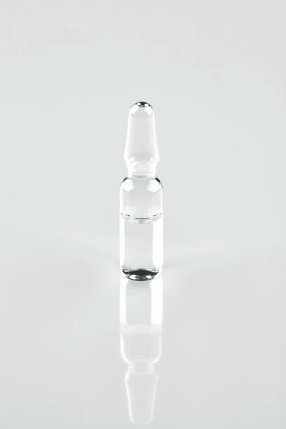 istock Transparent ampoule on white background 1042799572