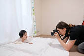 Photographer taking photos of a baby