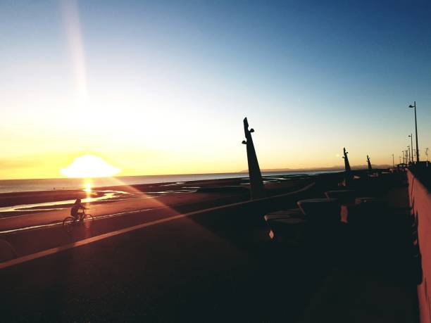 istock Cycling in the sunset 1042805680
