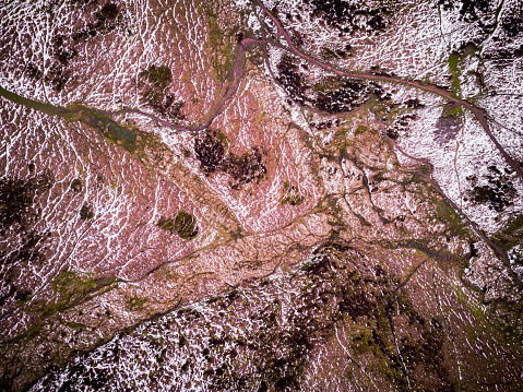 Satellite style view, taken around sunset on a wintery day by drone showing incredible landscape textures and colours