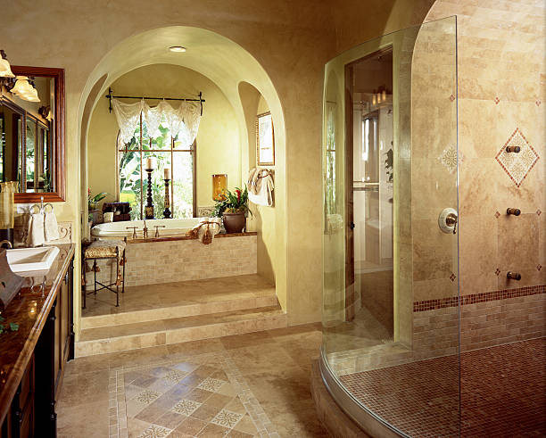 Interior Of A Luxury Bathroom With Stand Up Shower And Tub Stock