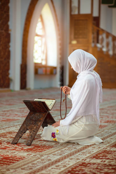 istock Crop Muslim woman with string of beads 1042814070