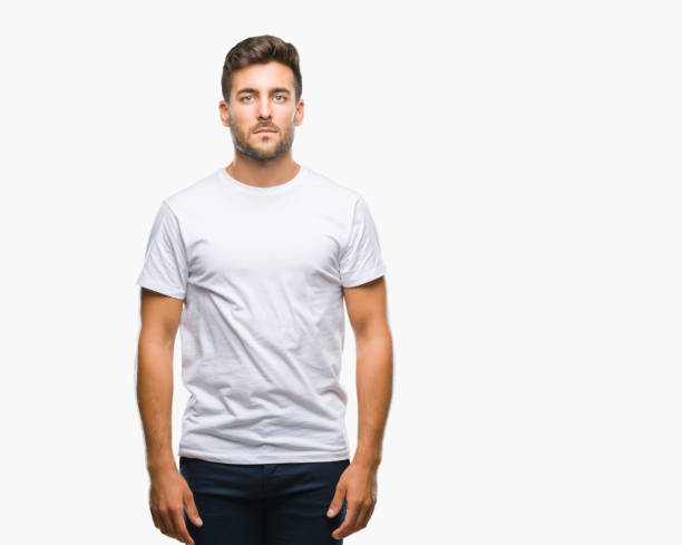 istock Young handsome man over isolated background with serious expression on face. Simple and natural looking at the camera. 1042816848