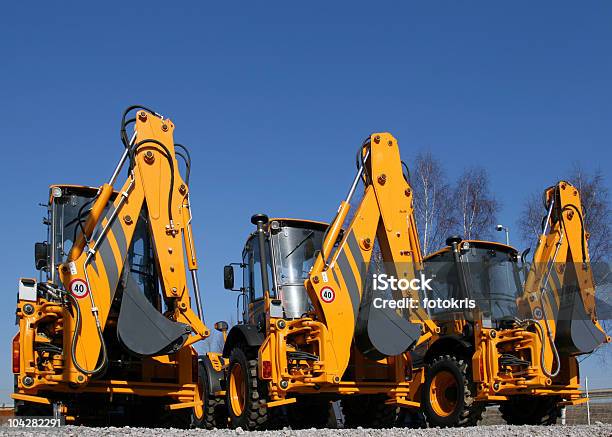 Baumaschine Stockfoto und mehr Bilder von Bagger - Bagger, In einer Reihe, Ausrüstung und Geräte