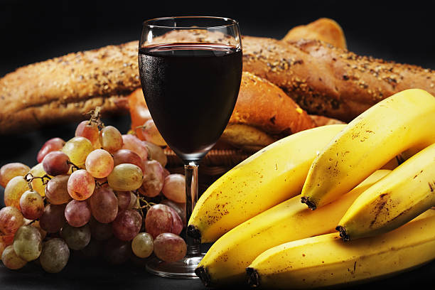 Red wine with fruits and pastry stock photo