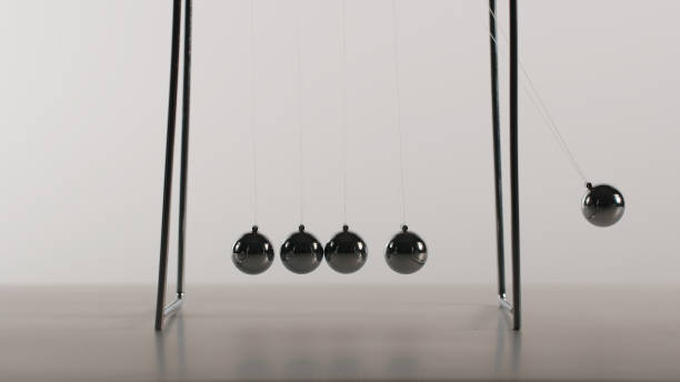 istock Balance balls is swinging - Front view 1042830926