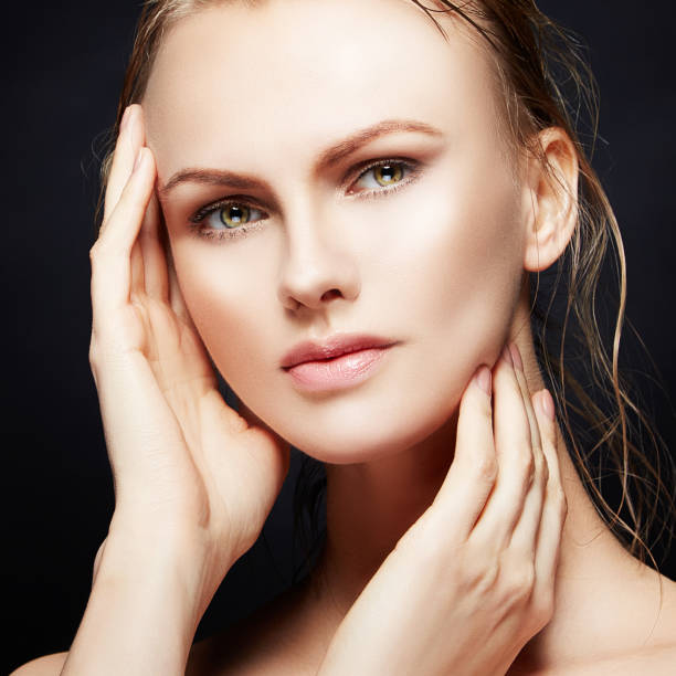 istock Young model woman beauty face close-up 1042833552