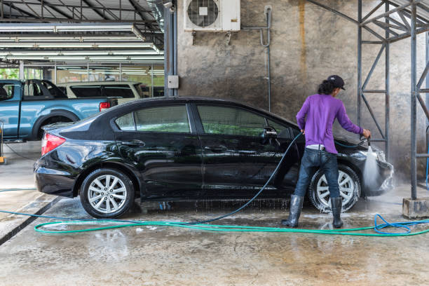 Cleaning the car (Car detailing) at car care shop stock photo