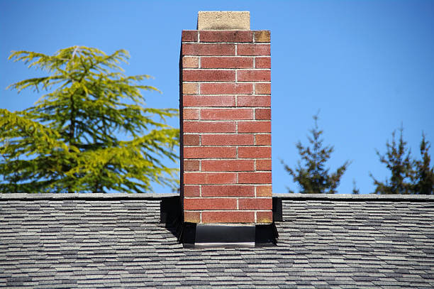 Brick Chimney  chimney stock pictures, royalty-free photos & images