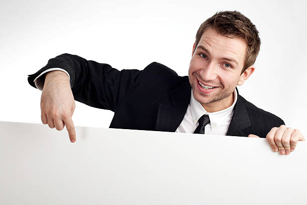 istock Businessman pointing at billboard 104286486